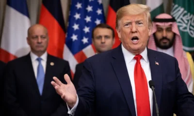 Trump speaking with international leaders present. Trump’s “Board of Peace”